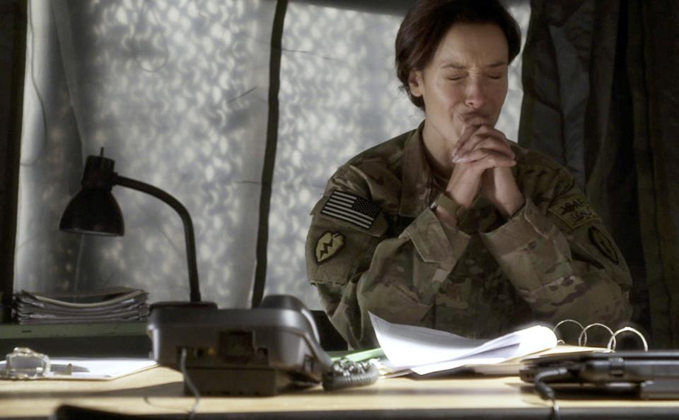 This image provided by WIGSCO, LLC shows Jennifer Beals, as Maj. Jo Stone in WIGS' "Lauren," reacting as she learns one of the soldiers under her command has reported being raped. The three-part Web series gives a close-up look at the challenges and obstacles women service members face in trying to find justice after being raped. (AP Photo/WIGSCO, LLC )