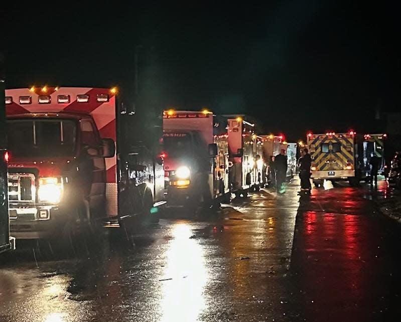 Ambulances line up outside Ascension St. Vincent Randolph Hospital in Winchester on the night of Thursday, March 14. Forty-one emergency vehicles and their crews reported for duty to the hospital from multiple cities and counties across the region in the minutes and hours after after a tornado plowed into the community.