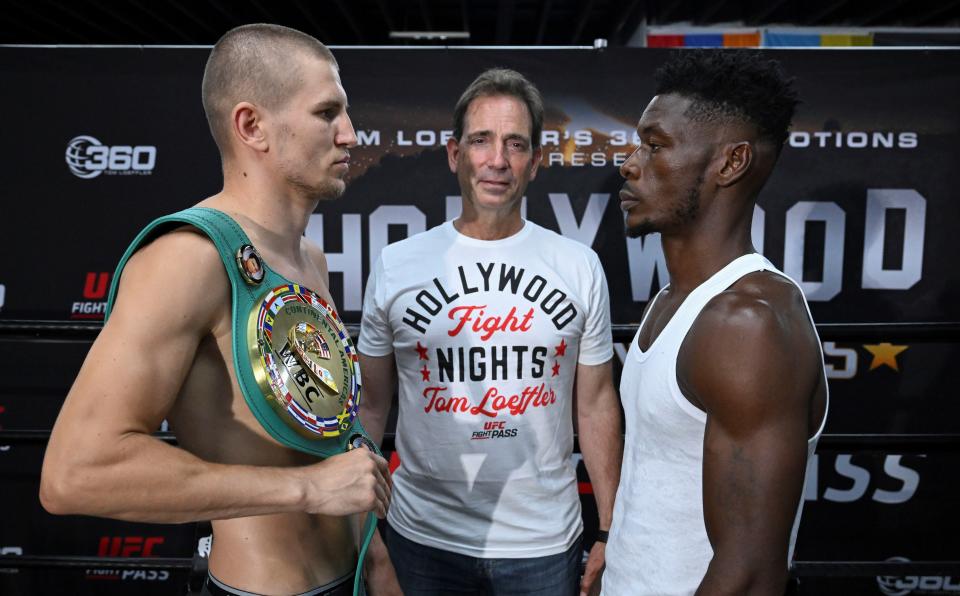 Serhii Bohachuk (left) goes face to face with Patrick Allotey while promoter Tom Loeffler looks on. Bohachuk and Allotey will headline a fight card Saturday night at Chumash Resort Casino in Santa Ynez.