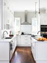 <p>“Monochromatic kitchens are a great way to form a cohesive look while injecting harmony into the space. This all white kitchen brings in bright light and really stands out against the dark stained floors. — <a href="https://www.thinkchicinteriors.com/" rel="nofollow noopener" target="_blank" data-ylk="slk:Malka Helft, Think Chic Interiors;elm:context_link;itc:0;sec:content-canvas" class="link "><strong><em>Malka Helft, Think Chic Interiors</em></strong></a></p>