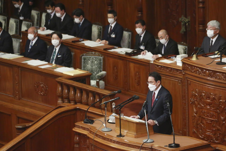 Japanese Prime Minister Fumio Kishida delivers his policy speech during an extraordinary Diet session at the lower house of parliament in Tokyo, Monday, Dec. 6, 2021. Japan confirmed on Monday its third case of a new variant of the coronavirus from an entrant from Italy, as the Prime Minister Fumio Kishida vowed to get prepared based on a worst-case scenario in dealing with a next resurgence. (AP Photo/Koji Sasahara)