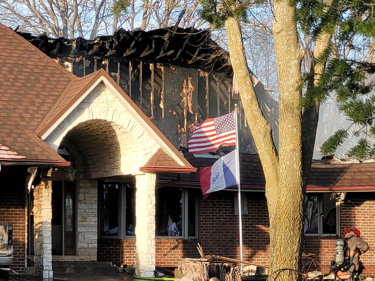 A fast-moving fire heavily damaged the longtime home of Roger and Sändra Spahr at 9855 N.E. Frisk Drive in Ankeny on Saturday, April 8, 2023.