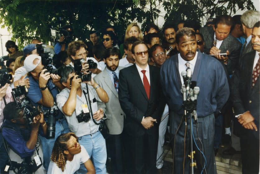 FILE PHOTO –– May 1, 1992 –– Rodney Glen King meets the press outside his lawyer's office in Beverly Hills . King asked that the killing, looting and destruction that his case against the LAPD caused would stop._(LAT photo by Larry Davis).