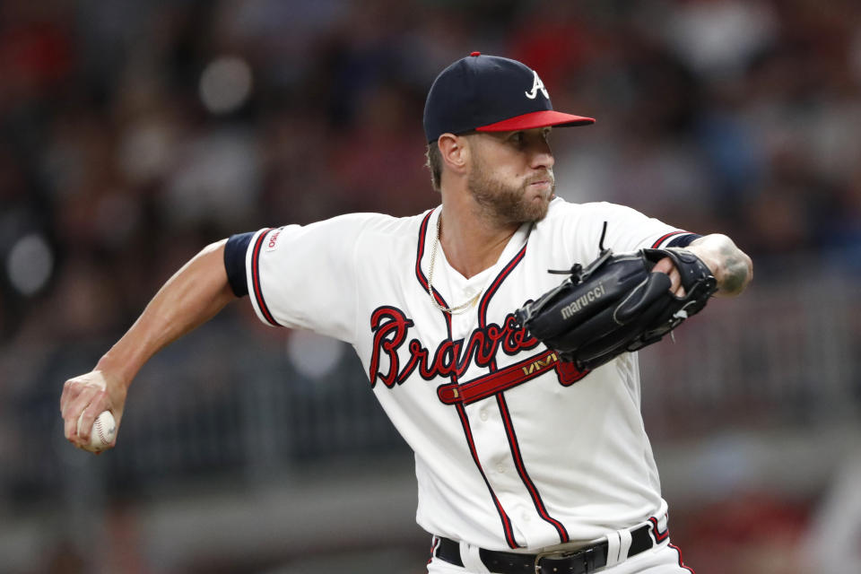 Atlanta Braves relief pitcher Shane Greene works the eighth inning of a baseball game against the Los Angeles Dodgers, Saturday, Aug. 17, 2019, in Atlanta. (AP Photo/John Bazemore)