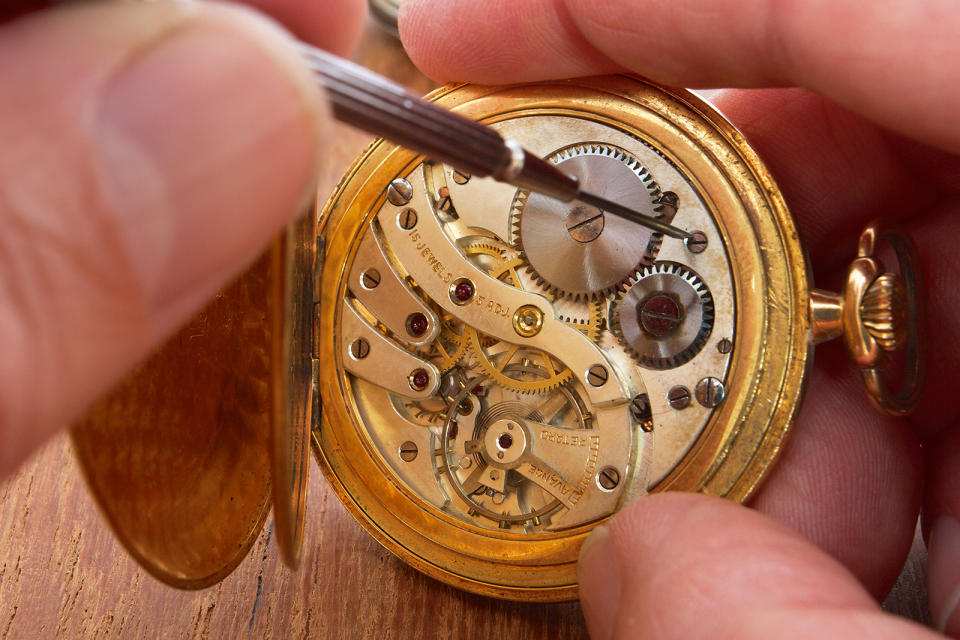 https://www.shutterstock.com/image-photo/hands-that-repair-old-pocket-watch-152485217