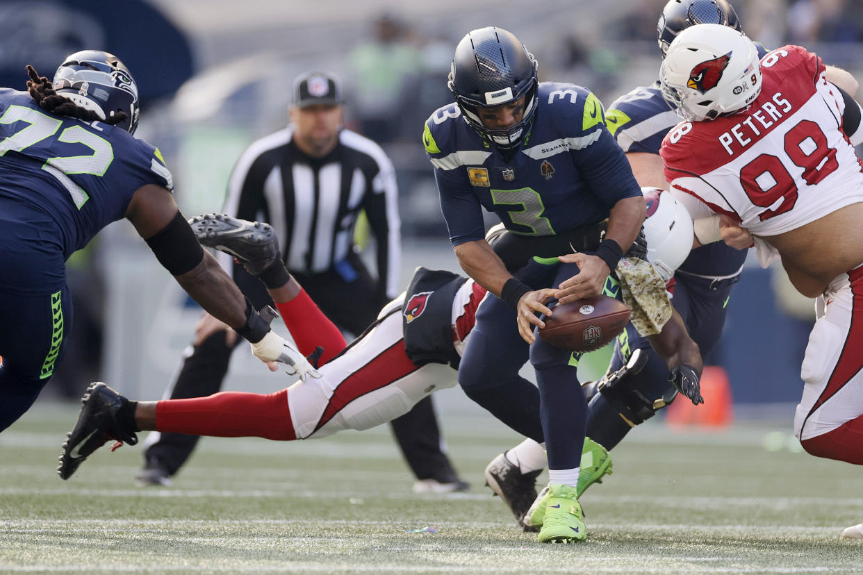 The Seahawks' plan for Russell Wilson right now makes little sense. (Photo by Steph Chambers/Getty Images)