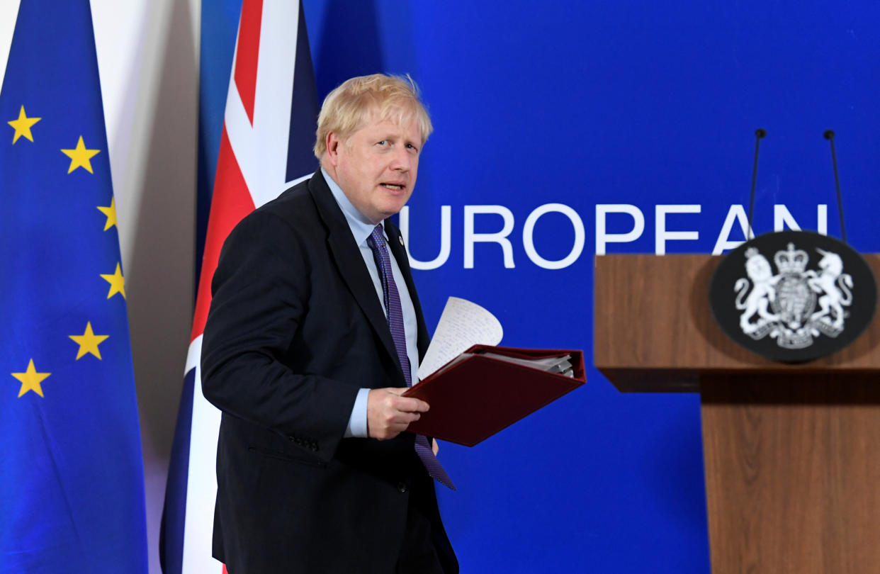 Britain's Prime Minister Boris Johnson arrives to speak at a news conference during the European Union leaders summit dominated by Brexit, in Brussels, Belgium October 17, 2019. REUTERS/Piroschka van de Wouw