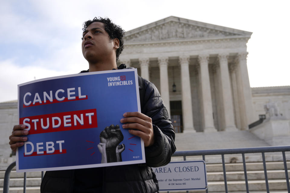 Student debt relief advocates gather outside the Supreme Court on Capitol Hill in Washington, Tuesday, Feb. 28, 2023, ahead of arguments over President Joe Biden's student debt relief plan. (AP Photo/Patrick Semansky)