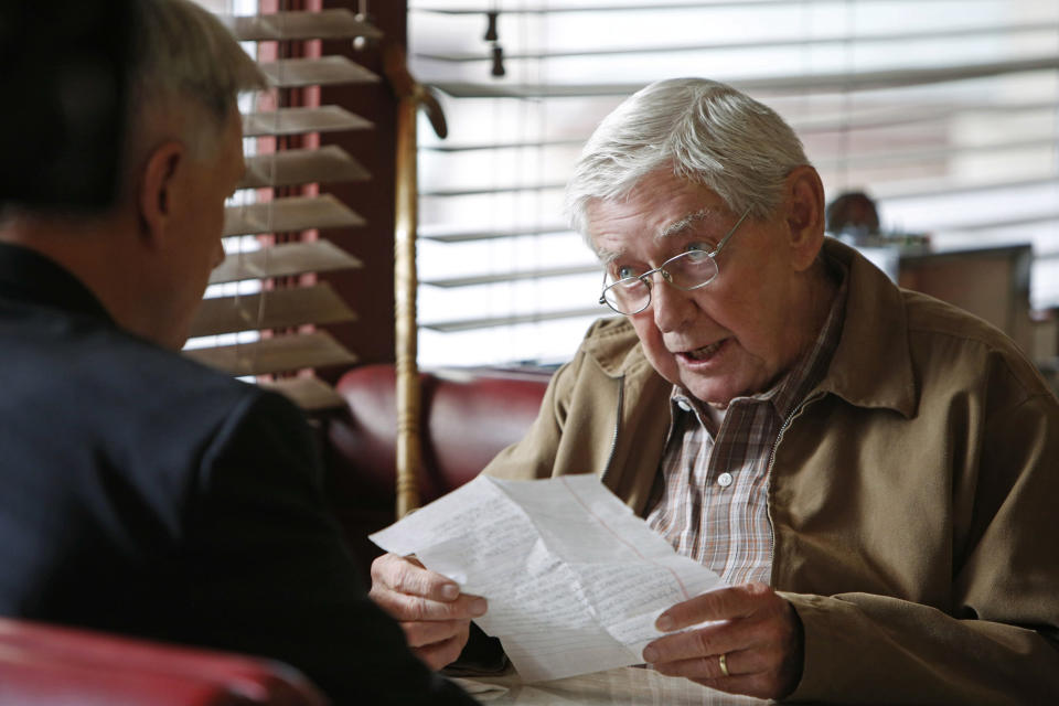 This photo released by CBS shows Mark Harmon, left, as Leroy Jethro Gibbs, and Ralph Waite, as Jackson Gibbs, in an episode, "Better Angels" in "NCIS," on the CBS Television Network. Waite, 85, who played the father in TV's hit series "The Waltons," has died. Waite's manager, Alan Mills, says the actor died midday Thursday, Feb. 13, 2014, in the Palm Springs area. (AP Photo/CBS, Cliff Lipson)