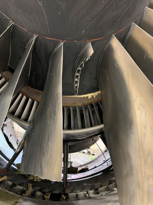 The damaged starboard engine of United Airlines flight 328 is seen following a February 20 engine failure incident