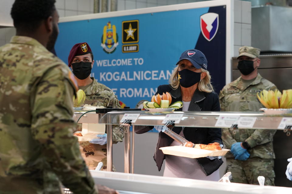 First lady Jill Biden serves meals to U.S. troops during a visit to the Mihail Kogalniceanu Air Base in Romania, Friday, May 6, 2022. (AP Photo/Susan Walsh, Pool)