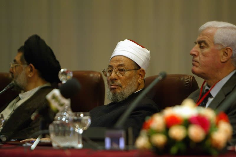 FILE PHOTO: Egyptian-born cleric Sheikh Youssef al-Qaradawi attends opening session of Al-Quds conference in Algiers
