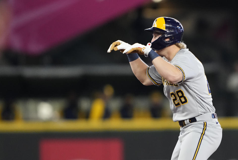 Milwaukee Brewers' Joey Wiemer celebrates hitting a double against the Seattle Mariners during the sixth inning of a baseball game Wednesday, April 19, 2023, in Seattle. (AP Photo/Lindsey Wasson)