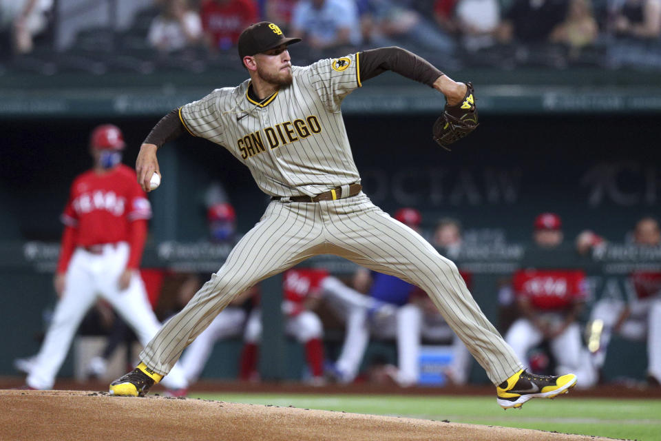San Diego Padres starting pitcher Joe Musgrove throws to a Texas Rangers batter during the first inning of a baseball game Friday, April 9, 2021, in Arlington, Texas. (AP Photo/Richard W. Rodriguez)