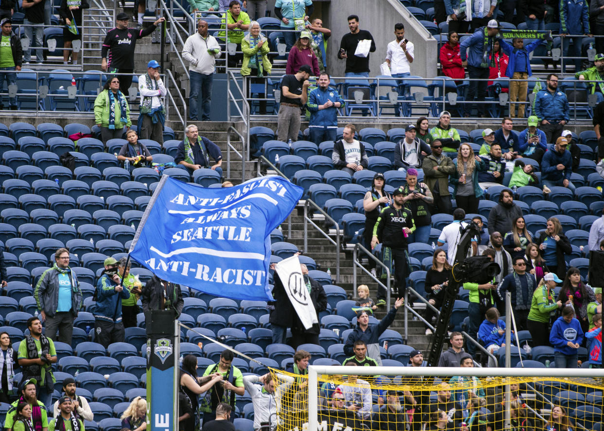 A large section of seats in the Seattle Sounders supporters section are emptied Sunday, Sept. 15, 2019, in the second half of an MLS soccer match  against the New York Red Bulls at CenturyLink Field in Seattle, Wash. (Joshua Bessex/The News Tribune via AP).