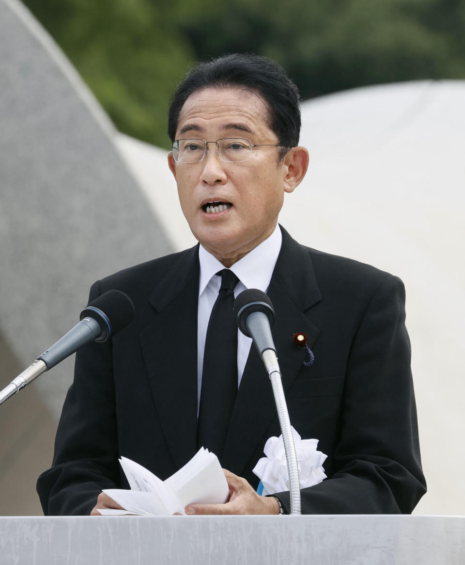 Japan's Prime Minister Fumio Kishida delivers a speech during the ceremony marking the 77th anniversary of the Aug. 6 atomic bombing in the city, at the Hiroshima Peace Memorial Park in Hiroshima, western Japan Saturday, Aug. 6, 2022. (Kenzaburo Fukuhara/Kyodo News via AP)