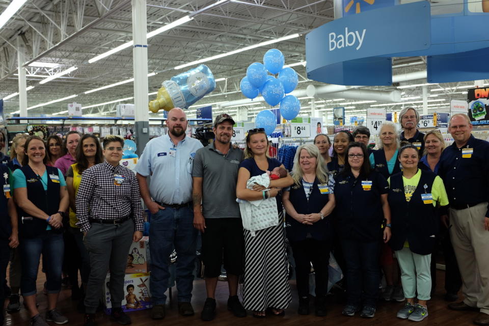 Walmart drivers and associates took care of a family with a newborn who had been displaced by Hurricane Michael. (Photo: Walmart)