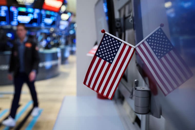 Traders work on the floor of the NYSE in New York