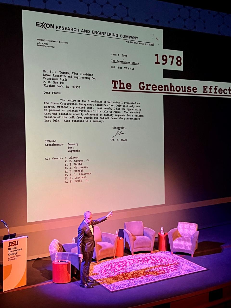 Bill Nye, on stage at the Tempe Center for the Arts on March 12, 2024, shows a 1978 letter from Exxon scientists about their conclusion that the continued burning of fossil fuel for energy would eventually lead to dangerous climate warming.