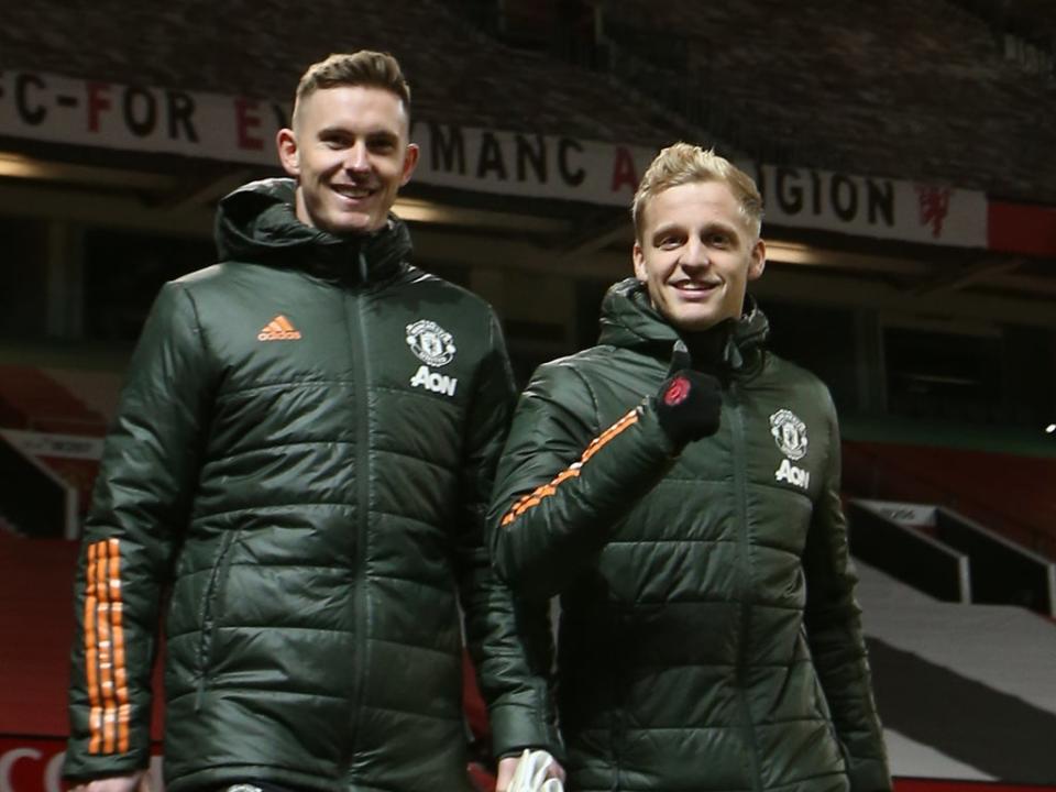 Manchester United pair Dean Henderson and Donny van de Beek (Manchester United via Getty Images)