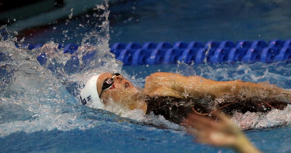 Sacred Heart’s Charlotte Crush won the 100 yard back stroke and set a new state record in the KHSAA girls swimming championship on Feb. 17, 2023.