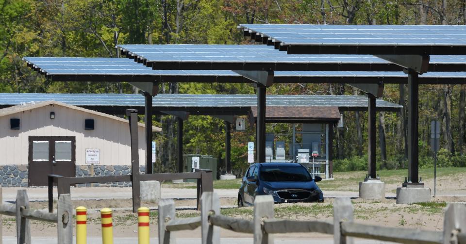 Solar panels installed at Presque Isle State Park Beach 8 will simultaneously generate renewable energy and shade parked vehicles, shown at the Millcreek Township park on May 10, 2024.