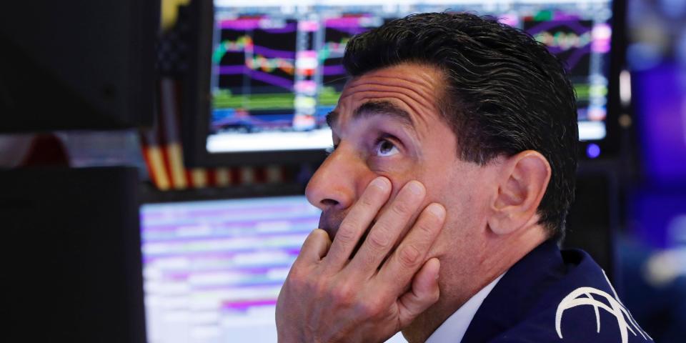 FILE - In this Aug. 12, 2019, photo specialist Peter Mazza works at his post on the floor of the New York Stock Exchange. Stocks of companies that do lots of business with China are obvious targets to sell when trade worries rise, and they’ve lagged sharply behind the rest of the market whenever President Donald Trump sends out a tariff tweet. But investors are also looking way beyond these first-order effects, as they pick out which stocks look most vulnerable to the trade war.