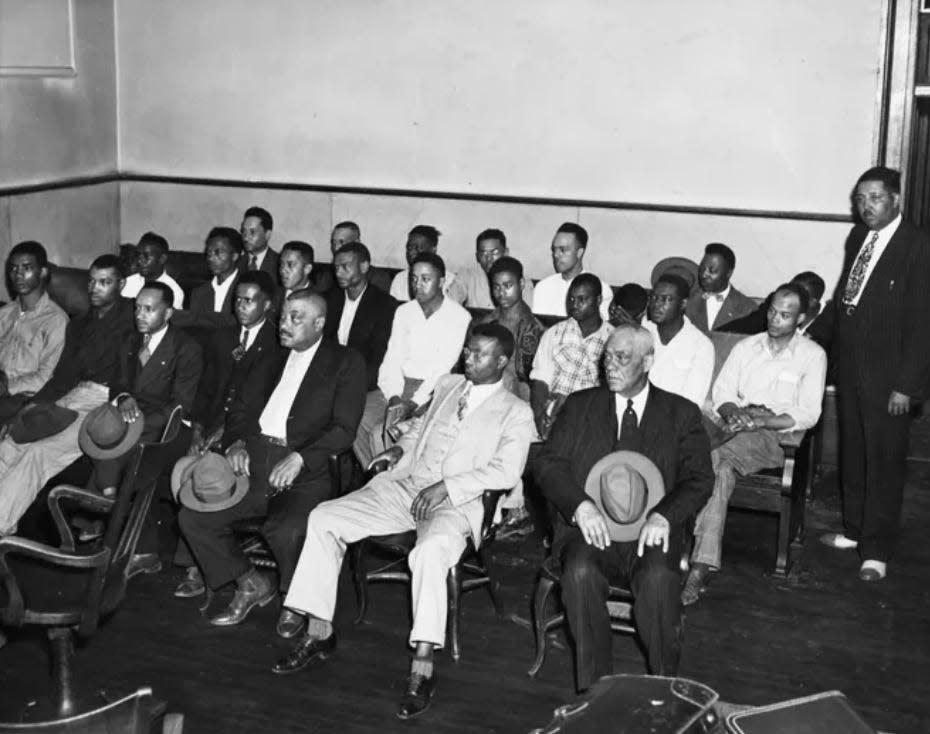 Twenty-five Black men sit in Maury County Court on May 28, 1946, for a hearing in their case.