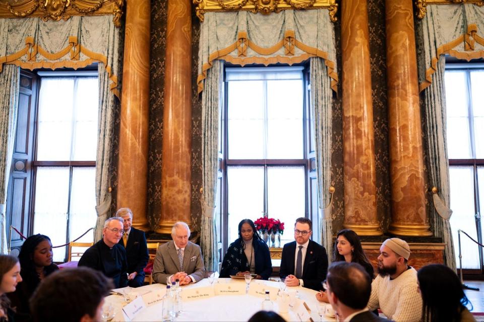 King Charles III hosts a gathering of young UK community and faith leaders at Buckingham Palace (PA)