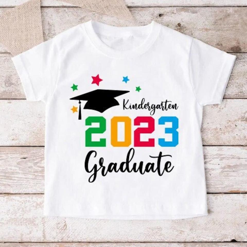 <p><a href="https://go.redirectingat.com?id=74968X1596630&url=https%3A%2F%2Fwww.etsy.com%2Flisting%2F1449871230%2Fkindergarten-graduate-2023-t-shirt&sref=https%3A%2F%2Fwww.bestproducts.com%2Fparenting%2Fkids%2Fg39851773%2Fbest-kindergarten-graduation-gifts%2F" rel="nofollow noopener" target="_blank" data-ylk="slk:Shop Now;elm:context_link;itc:0;sec:content-canvas" class="link ">Shop Now</a></p><p>Kindergarten Graduate 2023 T-Shirt</p><p>etsy.com</p><p>$11.83</p>