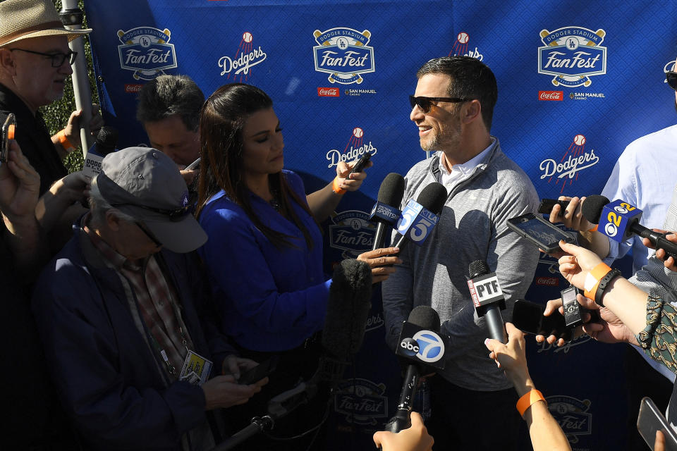 Los Angeles Dodgers president of baseball operations, Andrew Friedman, is interviewed by reporters during Dodger Stadium FanFest Saturday, Jan. 25, 2020, in Los Angeles. (AP Photo/Mark J. Terrill)