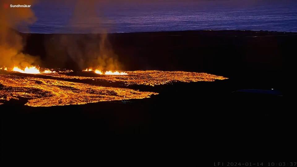 Lava dances around Iceland volcano as it erupts (Reuters)