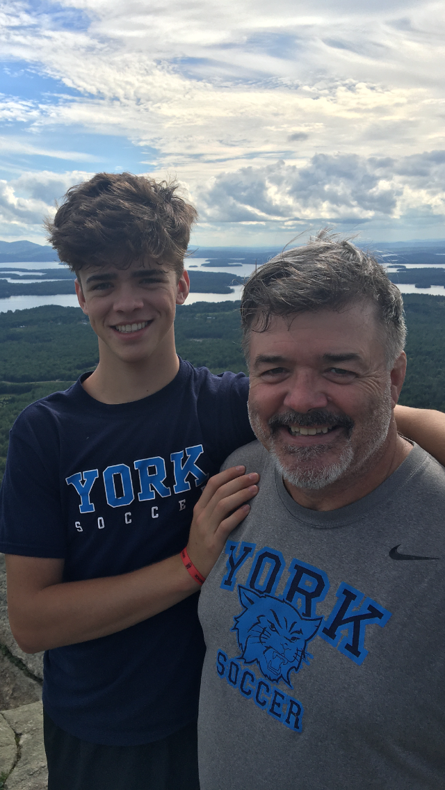 Brian Kenealy, a 2021 York High School alum, was mourned this week by the community after being killed in a car crash Saturday morning. He is pictured (left) with his father Dan Kenealy.