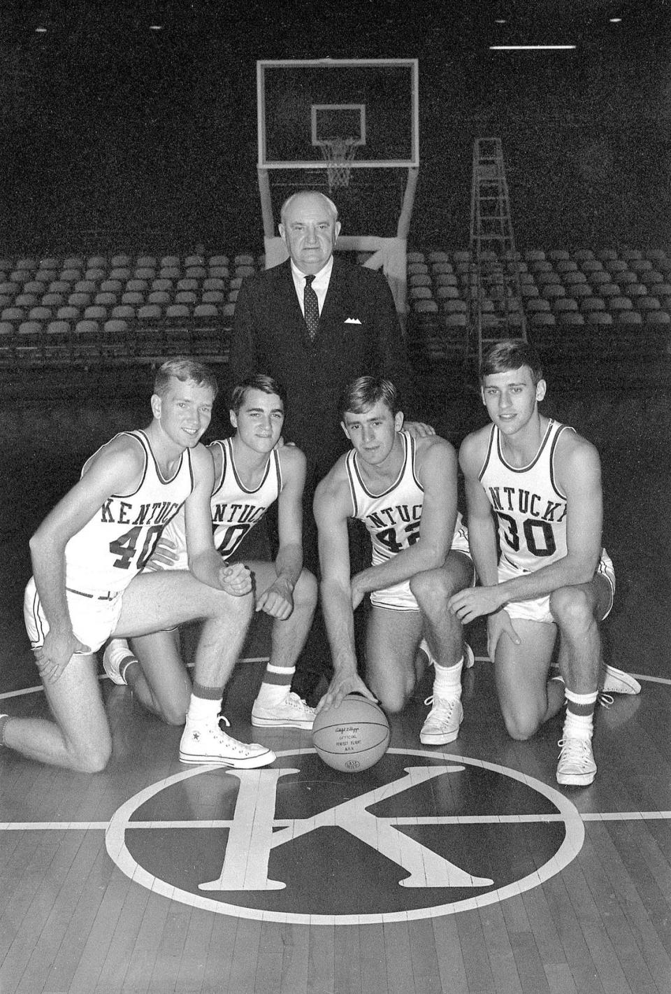 University of Kentucky basketball coach Adolph Rupp posed with his returning starters in October 1965 prior to the 1965-66 season. From left are, Larry Conley, Louie Dampier, Pat Riley and Tommy Kron. This team would be known as Rupp’s Runts and would lose the NCAA championship game to Texas Western (now UTEP).