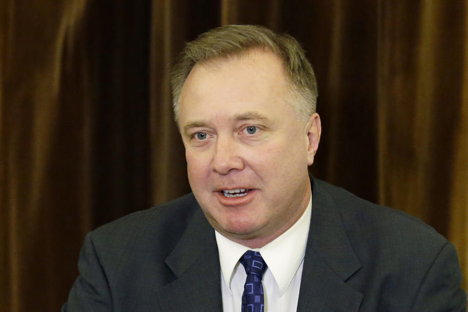 FILE - Washington Sen. Doug Ericksen, R-Ferndale, talks to reporters on Feb. 2, 2017 at the Capitol in Olympia, Wash. Ericksen died Friday, Dec. 17, 2021, after saying in November that he tested positive for COVID-19, although his cause of death was not immediately confirmed on Saturday. He was 52. (AP Photo/Ted S. Warren, File)