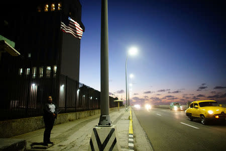 A security officer stands in front of the U.S. Embassy in Havana, Cuba, January 12, 2017. REUTERS/Alexandre Meneghini