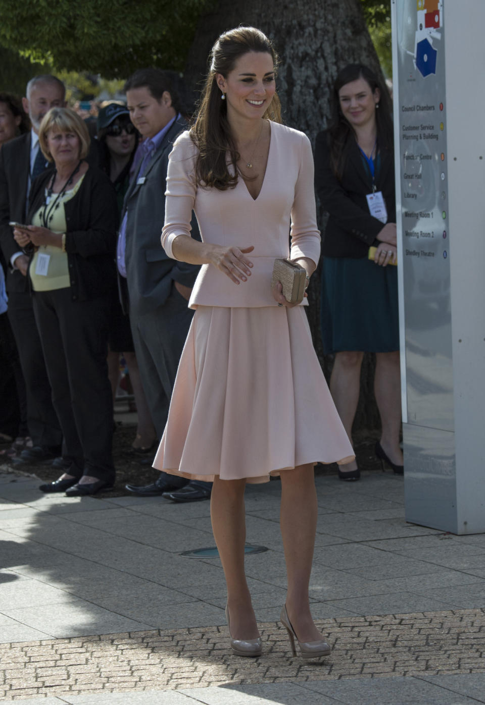 <p>Kate visited an Australian youth centre in a soft pink ensemble by Alexander McQueen. She accessorised with nude L.K. Bennett shoes and clutch.</p><p><i>[Photo: PA]</i></p>