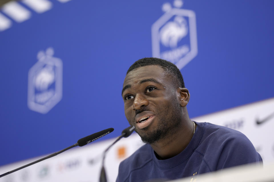 France's Youssouf Fofana answers questions during a press conference at the Jassim Bin Hamad stadium in Doha, Qatar, Thursday, Dec. 8, 2022. France will play against England during their World Cup quarter-final soccer match on Dec. 10. (AP Photo/Christophe Ena)