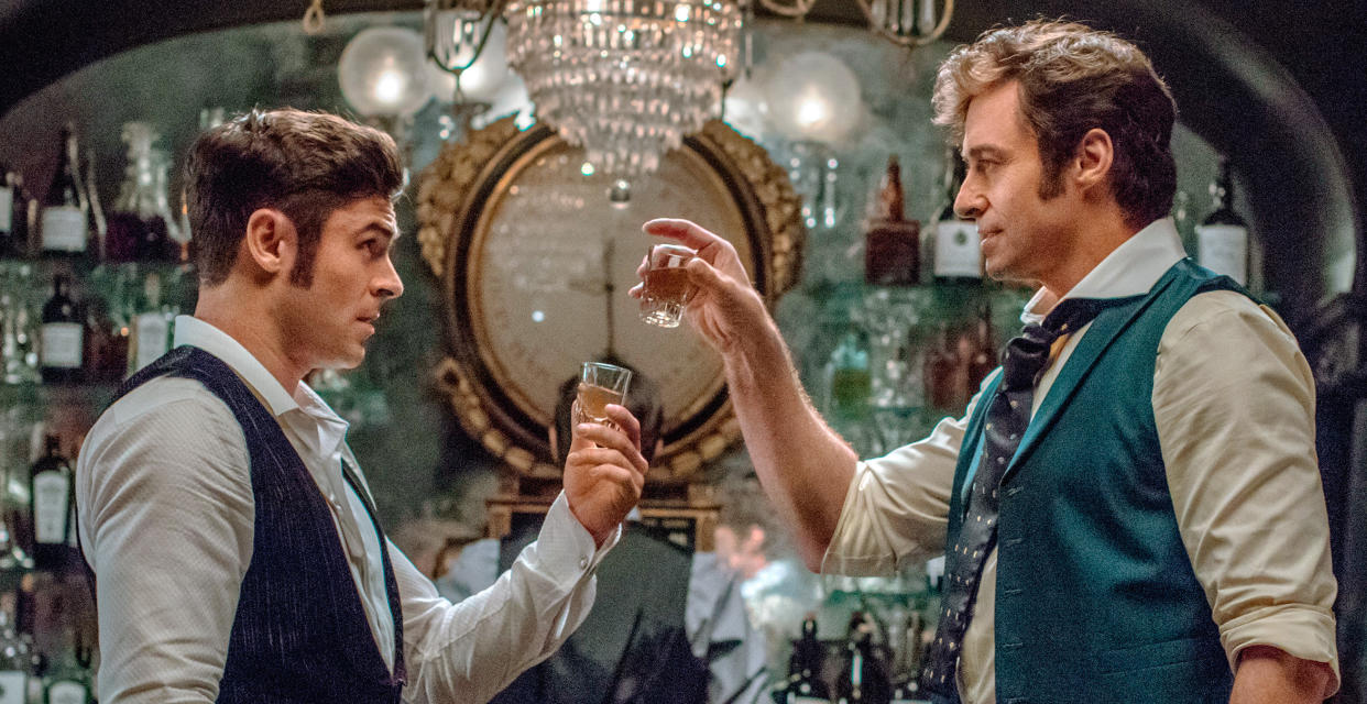 Zac Efron and Hugh Jackman have sideburns for DAYS in the first images from “The Greatest Showman”