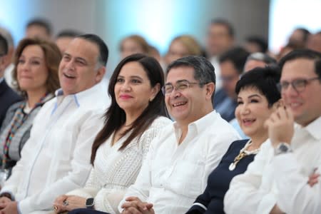 Honduras' President Juan Orlando Hernandez and his wife Ana Garcia attend the XVII Tuxtla Summit in San Pedro Sula
