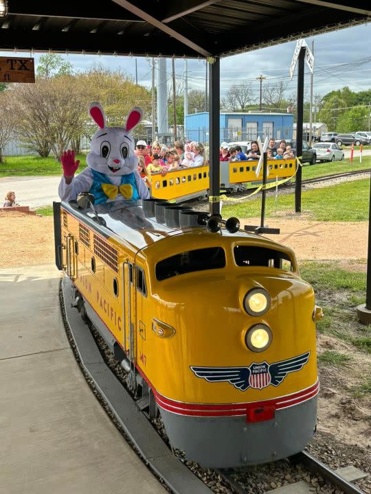The Easter Bunny driving Mineola’s Mini-Train ride. Photo courtesy of the City of Mineola.