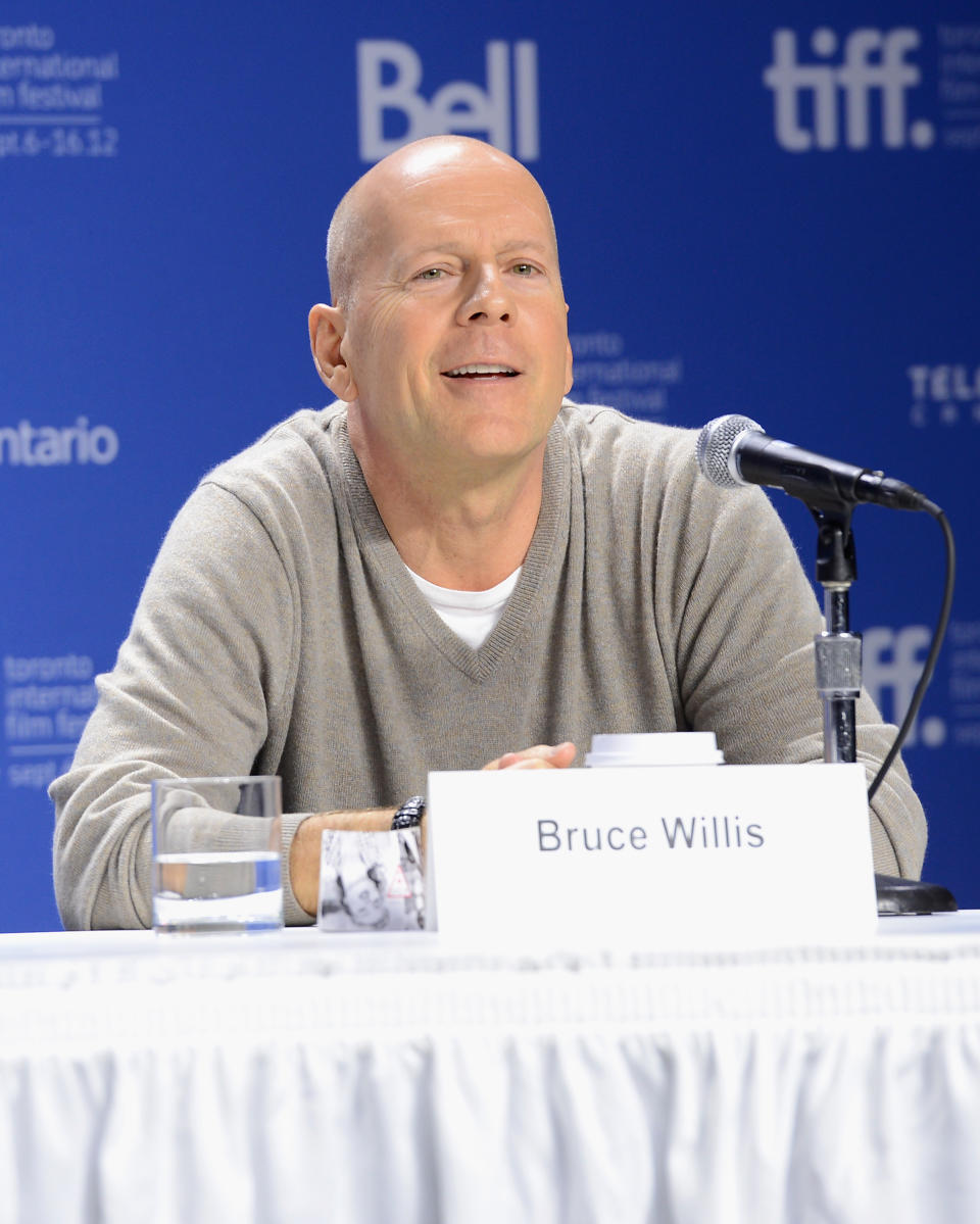 TORONTO, ON - SEPTEMBER 06: Actor Bruce Willis speaks onstage at the "Looper" press conference during the 2012 Toronto International Film Festival at TIFF Bell Lightbox on September 6, 2012 in Toronto, Canada. (Photo by Jason Merritt/Getty Images)