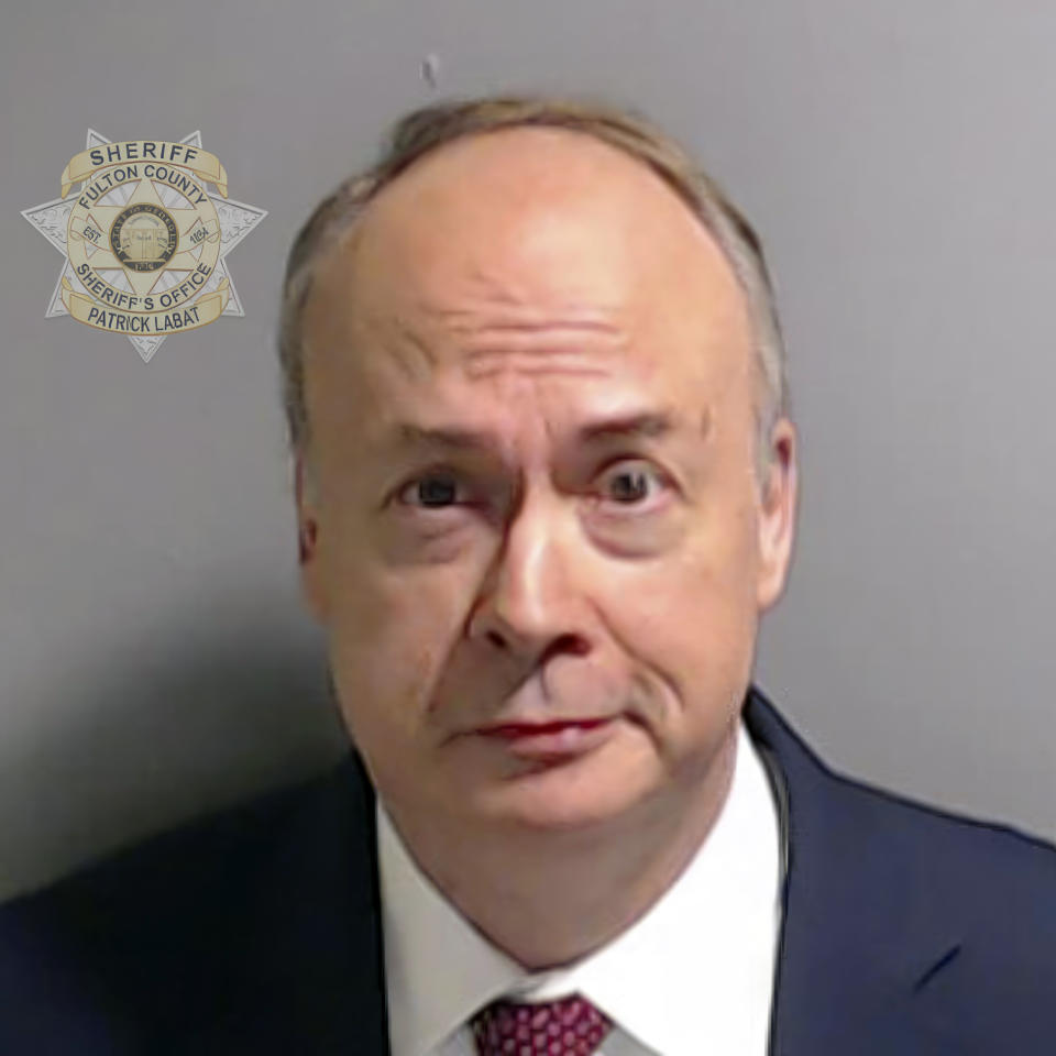 This booking photo provided by the Fulton County Sheriff's Office shows Jeffrey Clark on Friday, Aug. 25, 2023, in Atlanta, after he surrendered and was booked. Clark is charged alongside former President Donald Trump and 17 others, who are accused by Fulton County District Attorney Fani Willis of scheming to subvert the will of Georgia voters to keep the Republican president in the White House after he lost to Democrat Joe Biden. (Fulton County Sheriff's Office via AP)