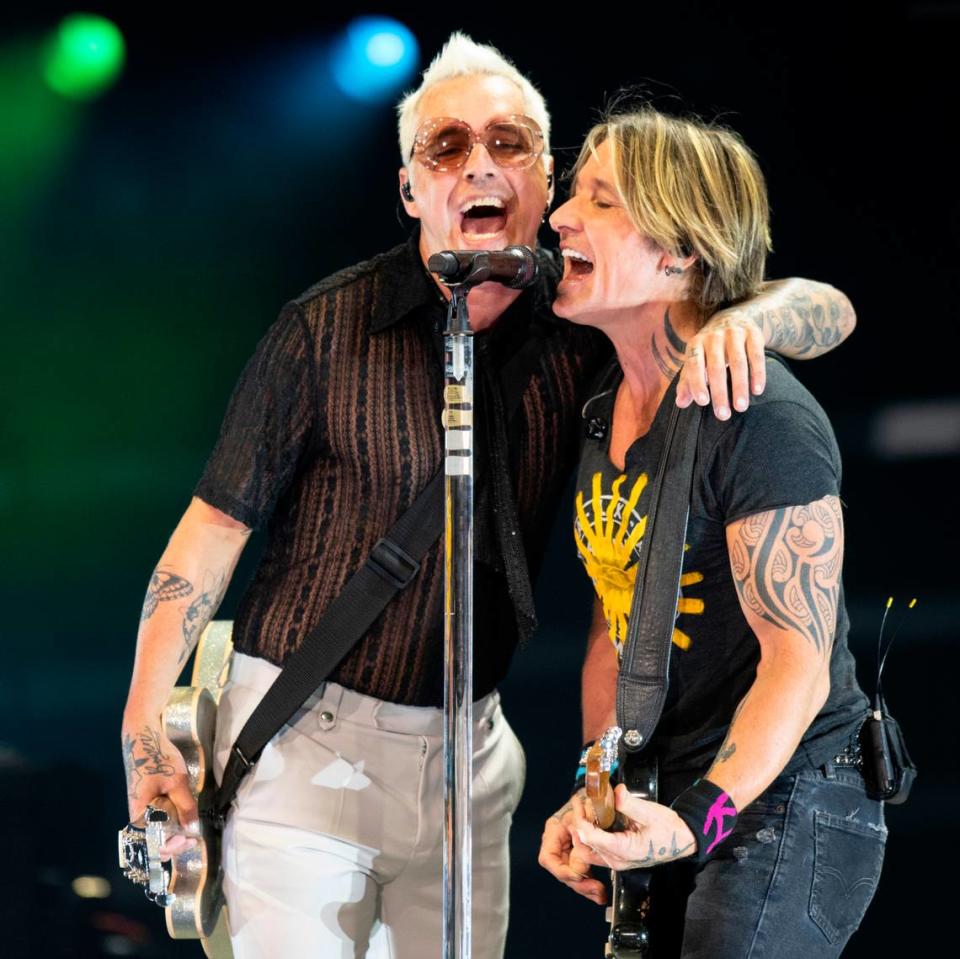 Keith Urban and second guitarist Nathan Barlowe in concert at Raleigh, N.C.’s Coastal Credit Union Music Pavilion at Walnut Creek, Saturday night, Aug. 10, 2022.