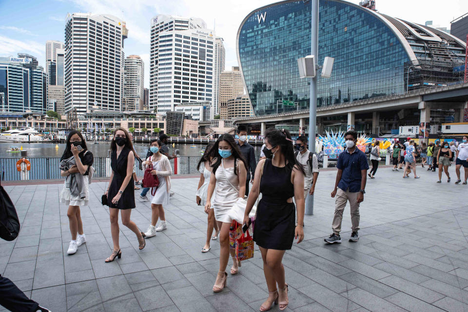 Members of the public are seen in Darling Harbour, Sydney, during the original Omicron outbreak. Source: AAP