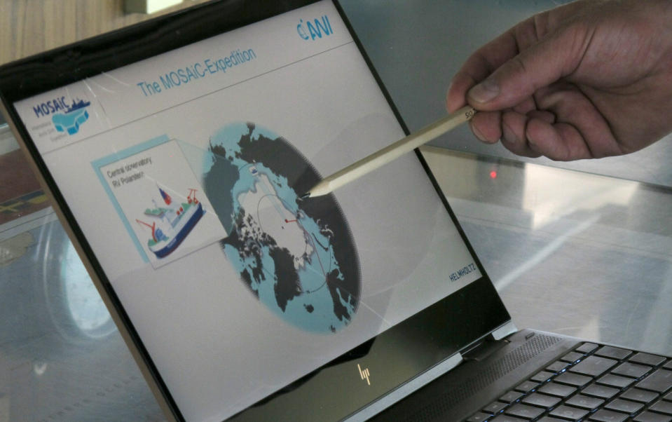 Markus Rex, an atmospheric scientist and leader of the MOSAiC expedition, points to a map, on the bridge of the German Arctic research vessel Polarstern in Bremerhaven, Germany, Wednesday, July 3, 2019. Scientists from 17 nations are preparing for a year-long mission to the central Arctic to study the impact that climate change is having on the frigid far north of the planet. Mission leader Markus Rex said that researchers plan to anchor the German icebreaker RV Polarstern to a large floe and set up camp on the ice as the sea freezes around them, conducting experiments throughout the Arctic winter. (AP Photos/Frank Jordans)