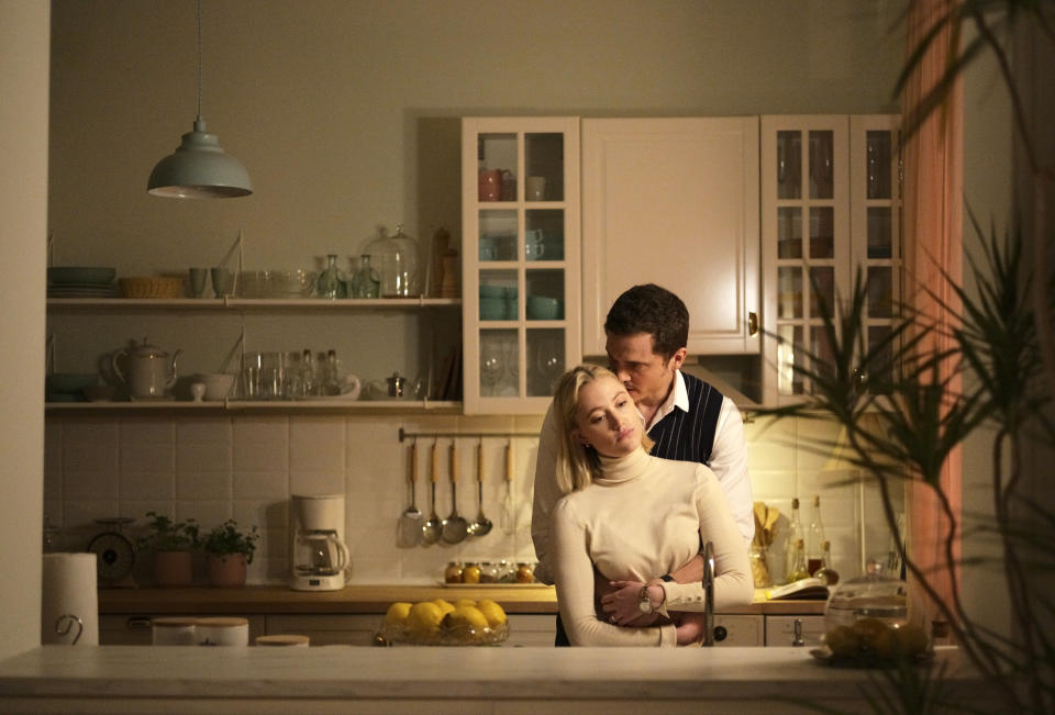 This image released by IFC Films shows Maika Monroe and Karl Glusman in a scene from "Watcher." (IFC Films via AP)