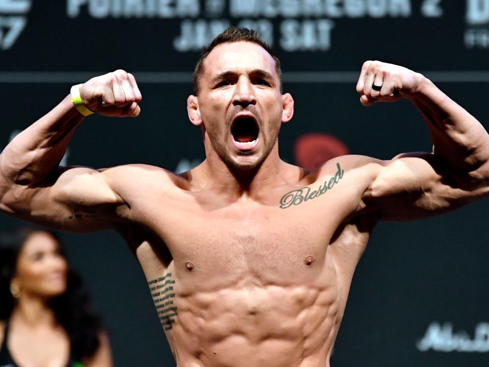 Michael Chandler (pictured) faces Charles Oliveira for the vacant UFC lightweight title (Zuffa LLC via Getty Images)