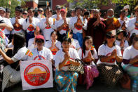 Buddhist monks and activists from Myanmar protest in front of the Thai embassy in Yangon, Myanmar, against the Thai military government invoking a special emergency law to let authorities search the Dhammakaya Temple in an attempt to arrest a former abbot, February 24, 2017. REUTERS/Soe Zeya Tun