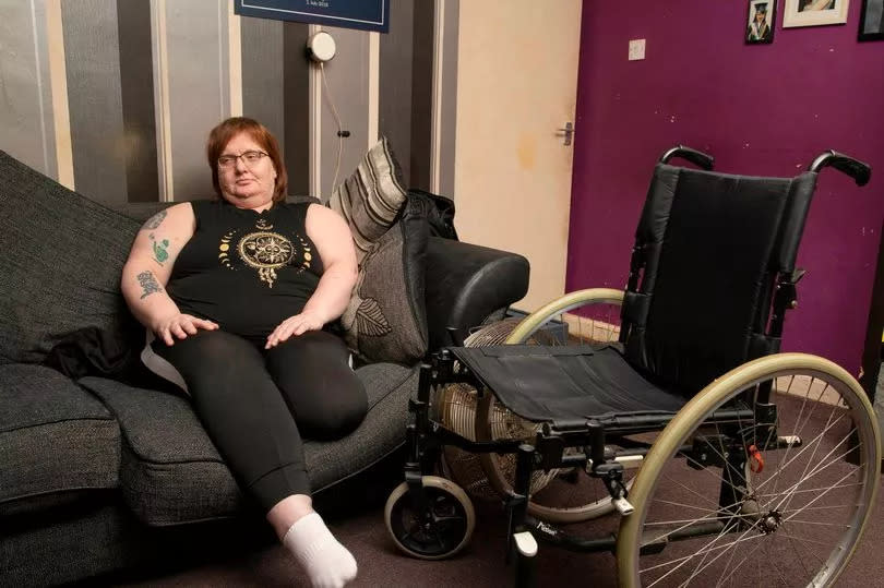 The disabled mum has to crawl through her tiny flat